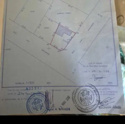 Terrain d'angle avec titre foncier — Kégué